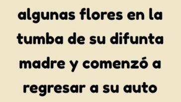 Un hombre coloco algunas flores en la tumba